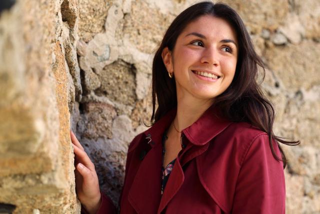 Corsican student Leria Maria Musso poses in AJaccio, on the French Mediterranean island of Corsica, on November 13, 2025. Syndicat agricole Via Campagnola (Confédération paysanne) has joined the anti-mafia coordination, created at the end of September 2025 and bringing together anti-mafia collectives, unions and environmental protection associations, which is calling for demonstrations on November 15, 2025 afternoon in Ajaccio and Bastia with the slogan "Assassins, mobsters, out!". (Photo by Pascal POCHARD-CASABIANCA / AFP)