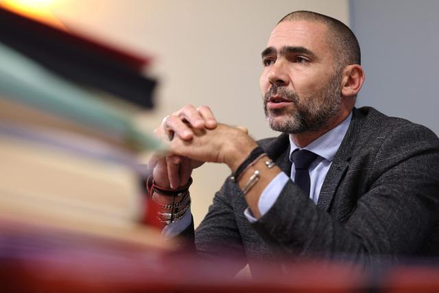 Bastia's prosecutor Jean-Philippe Navarre looks on as he answers to journalists at the Bastia courthouse in Bastia, on the French Mediterranean island of Corsica, on November 14, 2025. Syndicat agricole Via Campagnola (Confédération paysanne) has joined the anti-mafia coordination, created at the end of September 2025 and bringing together anti-mafia collectives, unions and environmental protection associations, which is calling for demonstrations on November 15, 2025 afternoon in Ajaccio and Bastia with the slogan "Assassins, mobsters, out!". (Photo by Pascal POCHARD-CASABIANCA / AFP)