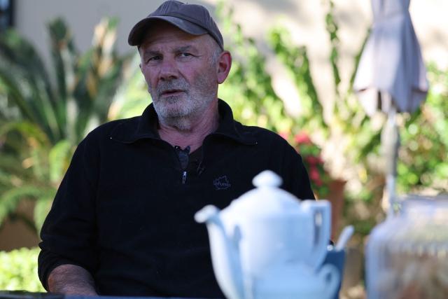Departemental President of agriculture syndicate Via Campgnola Jean Domionique Musso answers journalists at his home in Ajaccio, on the French Mediterranean island of Corsica, on November 13, 2025. Syndicat agricole Via Campagnola (Confédération paysanne) has joined the anti-mafia coordination, created at the end of September 2025 and bringing together anti-mafia collectives, unions and environmental protection associations, which is calling for demonstrations on November 15, 2025 afternoon in Ajaccio and Bastia with the slogan "Assassins, mobsters, out!". (Photo by Pascal POCHARD-CASABIANCA / AFP)
