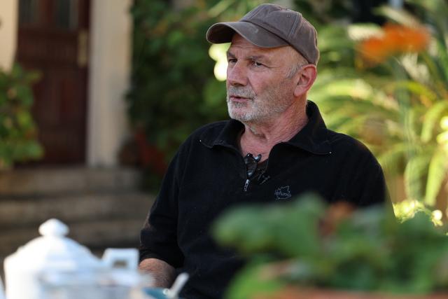 Departemental President of agriculture syndicate Via Campgnola Jean Domionique Musso answers journalists at his home in Ajaccio, on the French Mediterranean island of Corsica, on November 13, 2025. Syndicat agricole Via Campagnola (Confédération paysanne) has joined the anti-mafia coordination, created at the end of September 2025 and bringing together anti-mafia collectives, unions and environmental protection associations, which is calling for demonstrations on November 15, 2025 afternoon in Ajaccio and Bastia with the slogan "Assassins, mobsters, out!". (Photo by Pascal POCHARD-CASABIANCA / AFP)