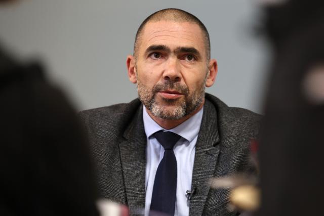 Bastia's prosecutor Jean-Philippe Navarre looks on as he answers to journalists at the Bastia courthouse in Bastia, on the French Mediterranean island of Corsica, on November 14, 2025. Syndicat agricole Via Campagnola (Confédération paysanne) has joined the anti-mafia coordination, created at the end of September 2025 and bringing together anti-mafia collectives, unions and environmental protection associations, which is calling for demonstrations on November 15, 2025 afternoon in Ajaccio and Bastia with the slogan "Assassins, mobsters, out!". (Photo by Pascal POCHARD-CASABIANCA / AFP)