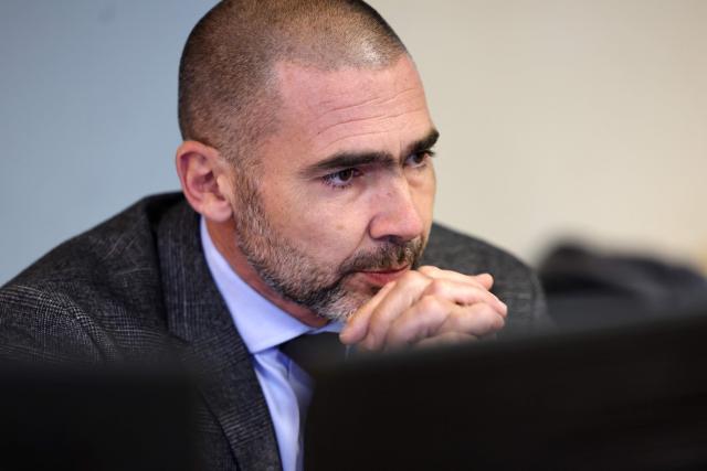 Bastia's prosecutor Jean-Philippe Navarre looks on as he answers to journalists at the Bastia courthouse in Bastia, on the French Mediterranean island of Corsica, on November 14, 2025. Syndicat agricole Via Campagnola (Confédération paysanne) has joined the anti-mafia coordination, created at the end of September 2025 and bringing together anti-mafia collectives, unions and environmental protection associations, which is calling for demonstrations on November 15, 2025 afternoon in Ajaccio and Bastia with the slogan "Assassins, mobsters, out!". (Photo by Pascal POCHARD-CASABIANCA / AFP)