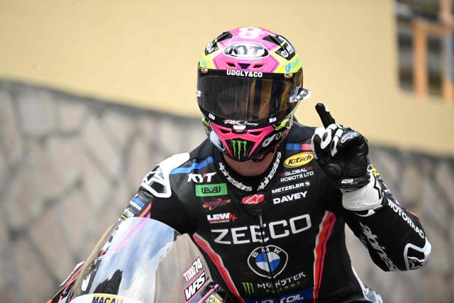 Zeeco BMW Motorrad British rider Davey Todd celebrates pole position during the qualifying session of the 57th Macau Motorcycle Grand Prix in Macau on November 15, 2025. (Photo by Peter PARKS / AFP)