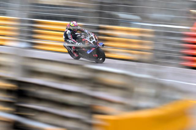 Zeeco BMW Motorrad British rider Davey Todd on his way to winning the 57th Macau Motorcycle Grand Prix in Macau on November 15, 2025. (Photo by Peter PARKS / AFP)
