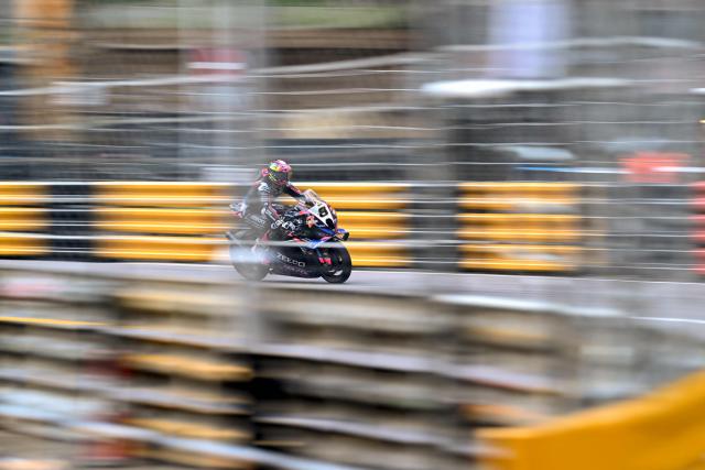 Zeeco BMW Motorrad British rider Davey Todd on his way to winning the 57th Macau Motorcycle Grand Prix in Macau on November 15, 2025. (Photo by Peter PARKS / AFP)