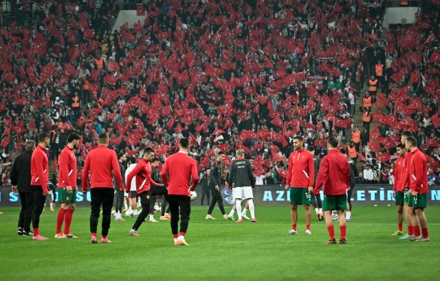 Bulgaria's players warm up before the FIFA World Cup 2026 European qualification football match between Turkey and Bulgaria at the Timsah Arena stadium, in Bursa, on November 15, 2025. (Photo by OZAN KOSE / AFP)