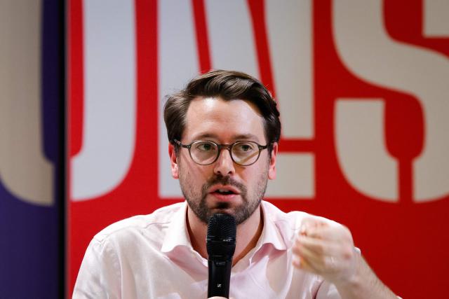 Ecologiste et Social's MP and Generations' coordinator, Benjamin Lucas-Lundy addresses the audience during a convention of the Front Populaire 2027 (Popular Front 2027), focused on education in Trappes,outside Paris on November 15, 2025. The united left, which is advocating a joint candidate for the 2027 presidential election, met on Saturday in Trappes to demonstrate its unbreakable unity in the face of the far right, announcing that a primary election would be held in "autumn 2026". (Photo by GEOFFROY VAN DER HASSELT / AFP)