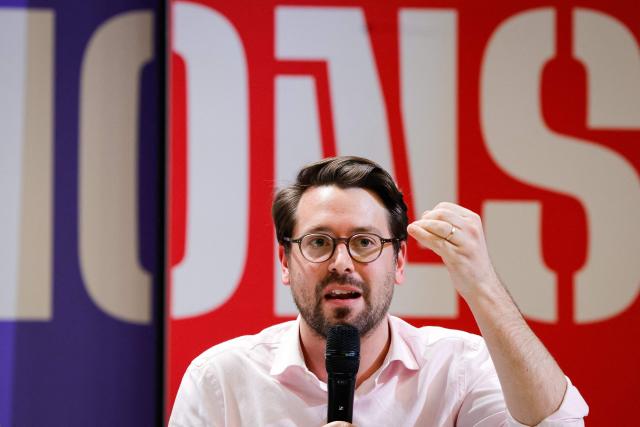 Ecologiste et Social's MP and Generations' coordinator, Benjamin Lucas-Lundy addresses the audience during a convention of the Front Populaire 2027 (Popular Front 2027), focused on education in Trappes,outside Paris on November 15, 2025. The united left, which is advocating a joint candidate for the 2027 presidential election, met on Saturday in Trappes to demonstrate its unbreakable unity in the face of the far right, announcing that a primary election would be held in "autumn 2026". (Photo by GEOFFROY VAN DER HASSELT / AFP)