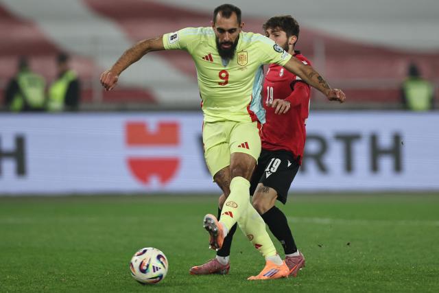 Spain's forward #09 Borja Iglesias attempts a shot on goal during the FIFA World Cup 2026 European qualification football match between Georgia and Spain at the Boris Paichadze National Stadium in Tbilisi on November 15, 2025. (Photo by Giorgi ARJEVANIDZE / AFP)