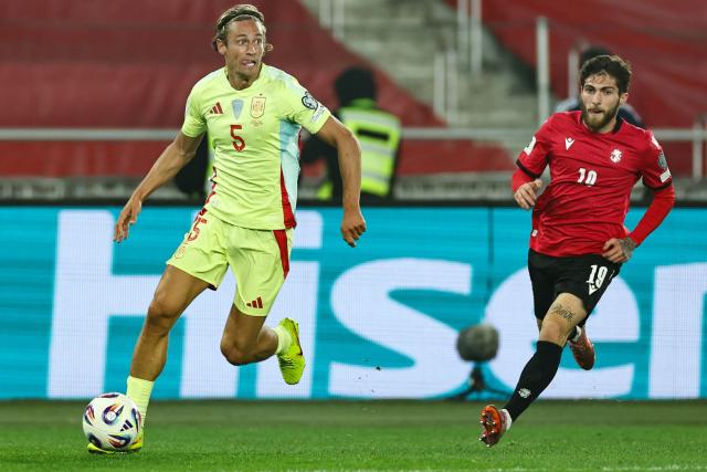 Spain's midfielder #05 Marcos Llorente and Georgia's midfielder #19 Giorgi Tsitaishvili vie for the ball during the FIFA World Cup 2026 European qualification football match between Georgia and Spain at the Boris Paichadze National Stadium in Tbilisi on November 15, 2025. (Photo by Giorgi ARJEVANIDZE / AFP)