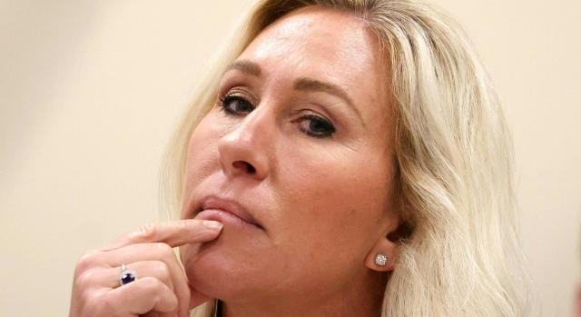 (FILES) Rep. Marjorie Taylor Greene (R-GA), Chair of the Subcommittee on Delivering On Government Efficiency (DOGE), listens during a “Oversight and Government Reform” hearing on Capitol Hill, in Washington, DC, on February 12, 2025. Greene, a former key political ally of Donald Trump, said on November 15, 2025 she was being targeted by a wave of threats after the US president lashed out at her on social media. The 51-year-old Republican congresswoman had previously been a standard-bearer of Trump's Make America Great Again Movement (MAGA), but the president on November 14 announced he was withdrawing all support for "'Wacky' Marjorie." He followed up again Saturday morning with multiple posts on his Truth Social platform attacking Greene as a "lightweight" and even a "traitor" to the Republican Party. (Photo by Alex Wroblewski / AFP)