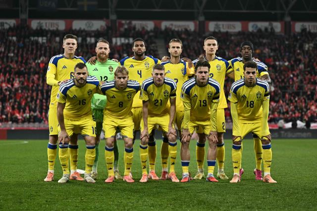 (From L, front) Sweden's midfielder #16 Jesper Karlstrom, Sweden's defender #08 Daniel Svensson, Sweden's midfielder #21 Alexander Bernhardsson, Sweden's midfielder #19 Mattias Svanberg, Sweden's midfielder #18 Yasin Ayari and (From L, rear) Sweden's defender #06 Emil Holm, Sweden's goalkeeper #12 Viktor Johansson, Sweden's defender #04 Isak Hien, Sweden's forward #07 Benjamin Nygren, Sweden's defender #02 Gustaf Lagerbielke and Sweden's midfielder #11 Anthony Elanga pose for a team photo ahead of the FIFA World Cup 2026 Group B European qualification football match between Switzerland and Sweden at the Geneva stadium, in Geneva, on November 15, 2025. (Photo by Fabrice COFFRINI / AFP)