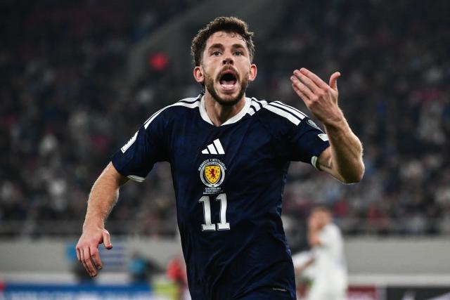 Scotland's forward #11 Ryan Christie celebrates after scoring his team's second goal during the FIFA World Cup 2026 Group C European qualification football match between Greece and Scotland at the Karaiskakis Stadium in Piraeus, on November 15, 2025. (Photo by Angelos TZORTZINIS / AFP)
