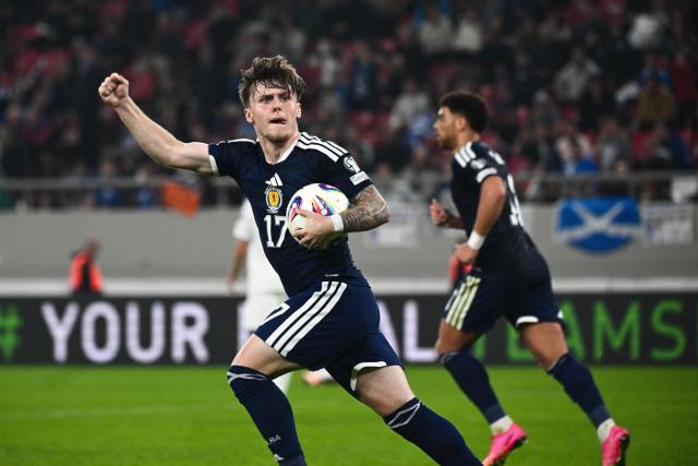 Scotland's forward #17 Ben Gannon-Doak (L) celebrates after scoring his team's first goal during the FIFA World Cup 2026 Group C European qualification football match between Greece and Scotland at the Karaiskakis Stadium in Piraeus, on November 15, 2025. (Photo by Angelos TZORTZINIS / AFP)