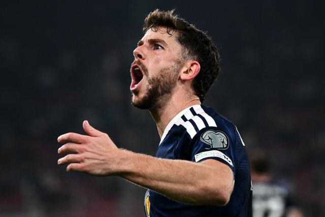 Scotland's forward #11 Ryan Christie celebrates after scoring his team's second goal during the FIFA World Cup 2026 Group C European qualification football match between Greece and Scotland at the Karaiskakis Stadium in Piraeus, on November 15, 2025. (Photo by Angelos TZORTZINIS / AFP)