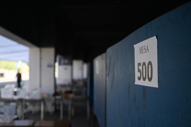 This view shows voting stations at the Julio Martínez Prádanos National Stadium voting center in Santiago, Chile, on November 15, 2025. Chile will hold the presidential election on November 16, 2025. (Photo by MARVIN RECINOS / AFP)
