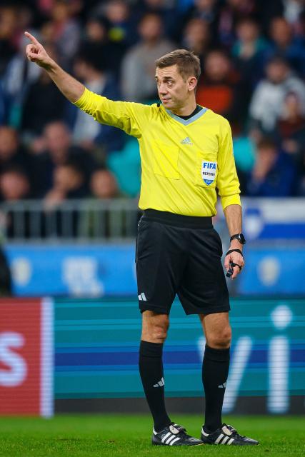 France’s referee Clement Turpin gestures during the FIFA World Cup 2026 Group B European qualification football match between Slovenia and Kosovo at the Stozice Stadium in Ljubljana, on November 15, 2025. (Photo by Jure Makovec / AFP)