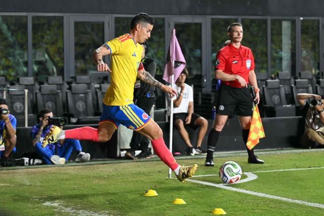 Colombia's midfielder #10 James Rodriguez takes a corner kick during the international friendly football match between Colombia and New Zealand at Chase Stadium in Fort Lauderdale, Florida, on November 15, 2025. (Photo by Chandan Khanna / AFP)