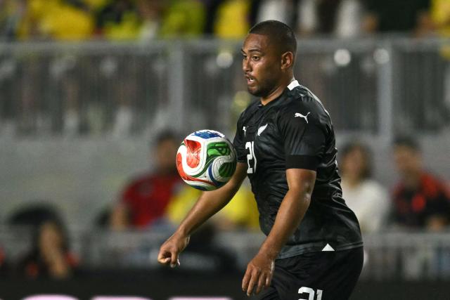 New Zealand's defender #21 Bill Tuiloma controls the ball during the international friendly football match between Colombia and New Zealand at Chase Stadium in Fort Lauderdale, Florida, on November 15, 2025. (Photo by CHANDAN KHANNA / AFP)