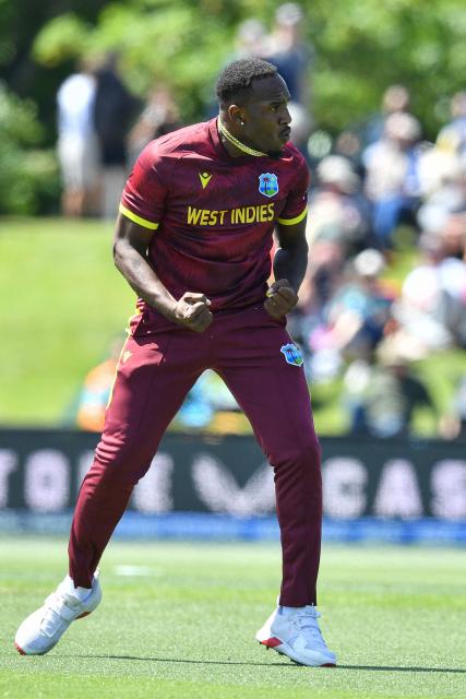 West Indies' Matthew Forde celebrates the dismissal of New Zealand's Will Young during the first one-day international cricket match between New Zealand and West Indies at Hagley Oval in Christchurch on November 16, 2025. (Photo by Sanka Vidanagama / AFP)