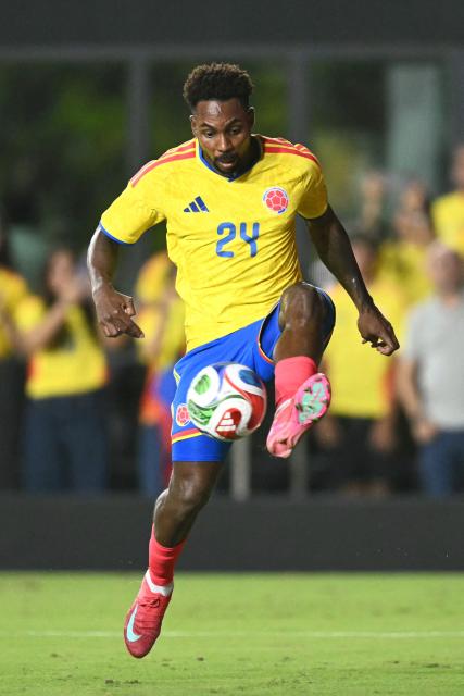 Colombia's defender #24 Alvaro Angulo controls the ball during the international friendly football match between Colombia and New Zealand at Chase Stadium in Fort Lauderdale, Florida, on November 15, 2025. (Photo by CHANDAN KHANNA / AFP)