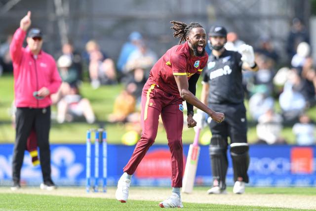 West Indies' Shamar Springer celebrates dismissing New Zealand's Michael Bracewell before the third umpire overturned the decision during the first one-day international cricket match between New Zealand and West Indies at Hagley Oval in Christchurch on November 16, 2025. (Photo by Sanka Vidanagama / AFP)