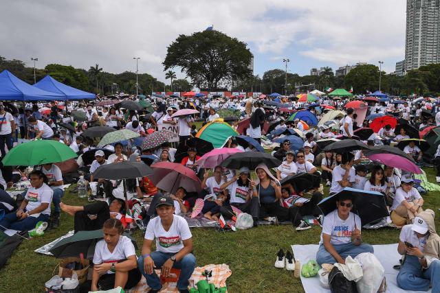 Members of religious group Iglesia ni Cristo attend an anti-corruption protest at a park in Manila on November 16, 2025. (Photo by Ted ALJIBE / AFP)