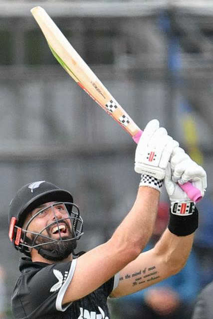 New Zealand's Daryl Mitchell bats during the first one-day international cricket match between New Zealand and West Indies at Hagley Oval in Christchurch on November 16, 2025. (Photo by Sanka Vidanagama / AFP)