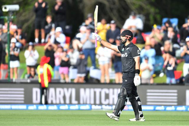 New Zealand's Daryl Mitchell walks back to the pavilion after his dismissal during the first one-day international cricket match between New Zealand and West Indies at Hagley Oval in Christchurch on November 16, 2025. (Photo by Sanka Vidanagama / AFP)