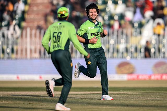 Pakistan's Mohammad Wasim (R) celebrates after taking the wicket of Sri Lanka's Kamil Mishara during the third one-day international (ODI) cricket match between Pakistan and Sri Lanka at the Rawalpindi Cricket Stadium in Rawalpindi on November 16, 2025. (Photo by Aamir QURESHI / AFP)