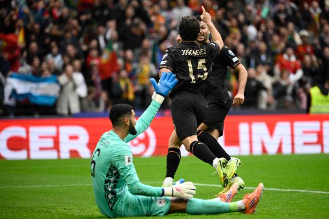 Portugal's midfielder #15 Joao Neves celebrates scoring his team's third goal during the 2026 World Cup qualifiers Europe zone group F football match between Portugal and Armenia, at Dragao stadium in Porto on November 16, 2025. (Photo by Miguel RIOPA / AFP)