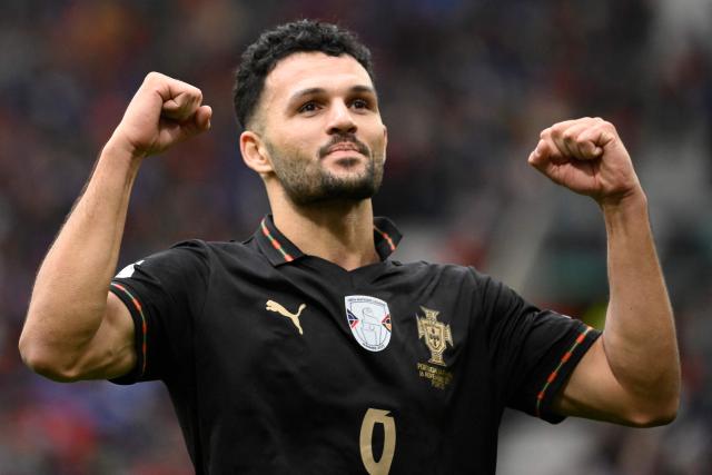 Portugal's forward #09 Goncalo Ramos celebrates his team's second goal during the 2026 World Cup qualifiers Europe zone group F football match between Portugal and Armenia, at Dragao stadium in Porto on November 16, 2025. (Photo by Miguel RIOPA / AFP)