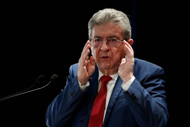 Founder of French left-wing party La France Insoumise (LFI) Jean-Luc Melenchon gestures as he gives a speech during a LFI meeting in Saint-Pierre-des-Corps, central France, on November 16, 2025. (Photo by JEAN-FRANCOIS MONIER / AFP)