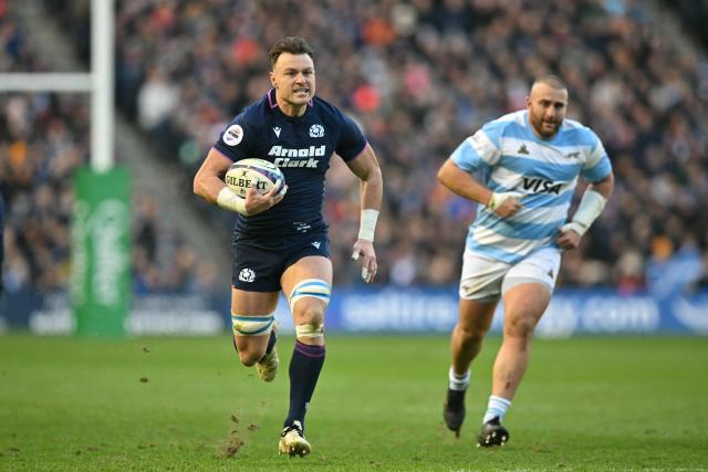 Scotland's number 8 Jack Dempsey runs in their first try during the Autumn Nations Series international rugby union match between Scotland and Argentina at Murrayfield in Edinburgh on November 16, 2025. (Photo by ANDY BUCHANAN / AFP)