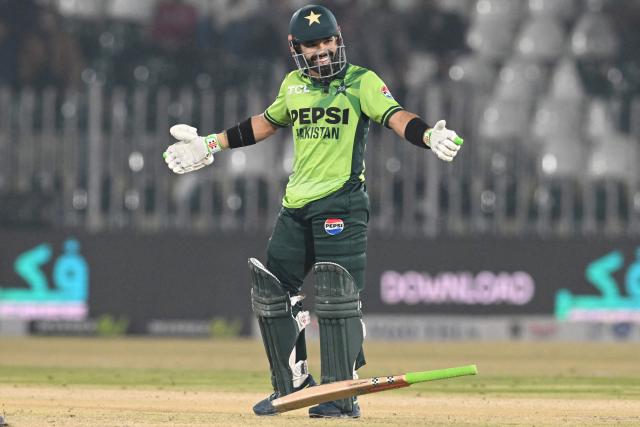 Pakistan's Mohammad Rizwan celebrares after scoring a half century (50 runs) during the third one-day international (ODI) cricket match between Pakistan and Sri Lanka at the Rawalpindi Cricket Stadium, in Rawalpindi, on November 16, 2025. (Photo by Aamir QURESHI / AFP)