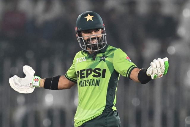 Pakistan's Mohammad Rizwan celebrares after scoring a half century (50 runs) during the third one-day international (ODI) cricket match between Pakistan and Sri Lanka at the Rawalpindi Cricket Stadium, in Rawalpindi, on November 16, 2025. (Photo by Aamir QURESHI / AFP)