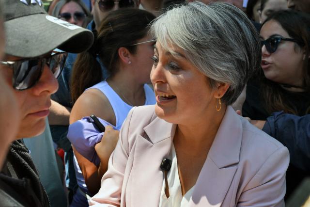 Chile's presidential candidate Jeannette Jara, of the Unidad por Chile coalition, leaves after voting during the general election in Santiago on November 16, 2025. Chileans are voting in a presidential election shaped by rising concerns over violent crime, with candidates pledging tougher measures against transnational gangs and the far-right promising to carry out mass migrant deportations. (Photo by RODRIGO ARANGUA / AFP)