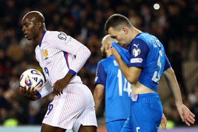 France's forward #19 Jean-Philippe Mateta celebrates after scoring the team's first goal during the FIFA World Cup 2026 European qualification football match between Azerbaijan and France at the Tofiq Bahramov Republican Stadium in Baku on November 16, 2025. (Photo by FRANCK FIFE / AFP)