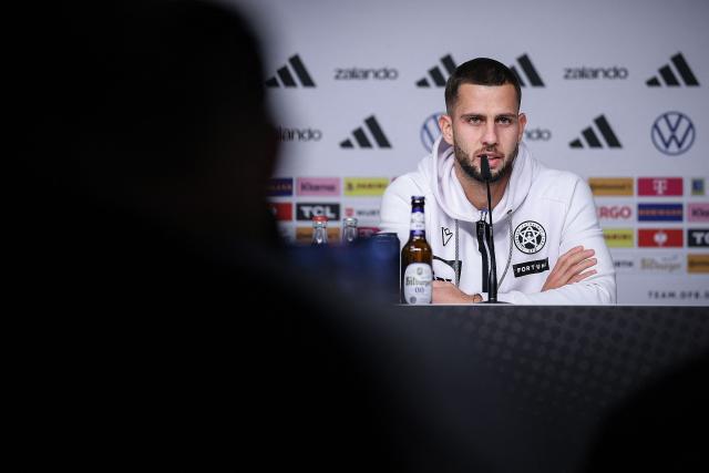 Slovakia's defender #16 David Hancko addresses a press conference in Leipzig, eastern Germany on November 16, 2025, on the eve of the FIFA World Cup 2026 European qualification Group A football match between Germany and Slovakia. (Photo by RONNY HARTMANN / AFP)