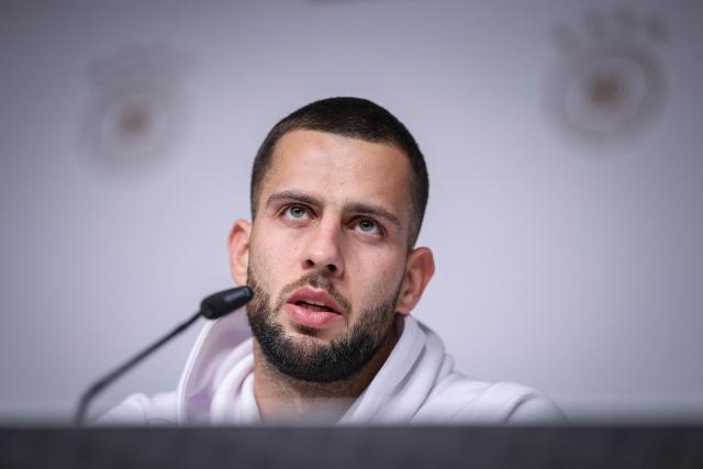 Slovakia's defender #16 David Hancko addresses a press conference in Leipzig, eastern Germany on November 16, 2025, on the eve of the FIFA World Cup 2026 European qualification Group A football match between Germany and Slovakia. (Photo by RONNY HARTMANN / AFP)