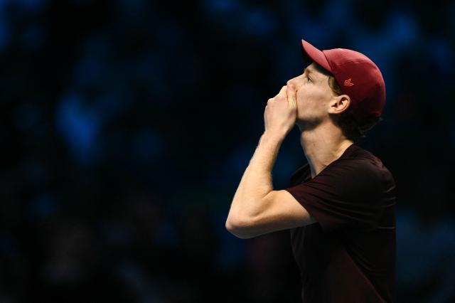 Italy's Jannik Sinner reacts during the men's single final match against Spain's Carlos Alcaraz at the ATP Finals tennis tournament, in Turin, on November 16, 2025. (Photo by Marco BERTORELLO / AFP)