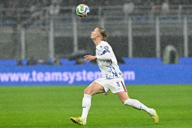 Norway's  captain #09 Erling Braut Haaland controls the ball during the FIFA World Cup 2026 European qualification football match between Italy and Norway, at the San Siro Stadium, in Milan, on November 16, 2025. (Photo by Stefano RELLANDINI / AFP)