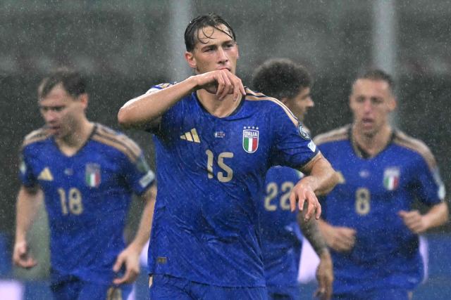 Italy's forward #15 Francesco Pio Esposito celebrates scoring his team's first goal during the FIFA World Cup 2026 European qualification football match between Italy and Norway, at the San Siro Stadium, in Milan, on November 16, 2025. (Photo by Stefano RELLANDINI / AFP)