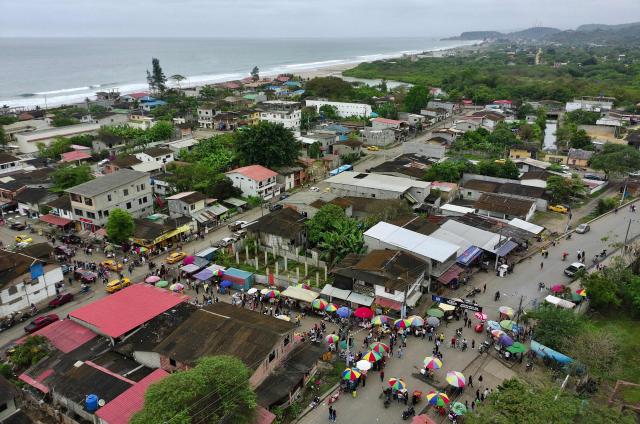 This view shows Manglaralto during the referendum, in Santa Elena province, Ecuador, on November 16, 2025. Ecuadoreans are voting in a referendum proposed by President Daniel Noboa on whether to allow the return of foreign military bases, draft a new constitution that could expand presidential powers, eliminate public funding for political parties, and reduce the number of lawmakers. (Photo by Marcos PIN / AFP)