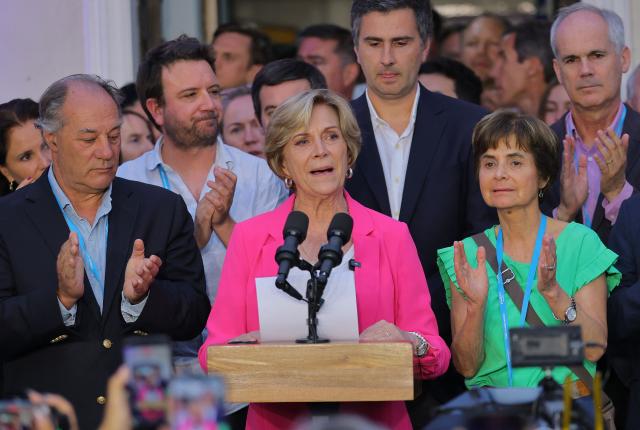 Chile's presidential candidate Evelyn Matthei, of the Independent Democratic Union party, delivers a conceding speech after knowing the results of the general election, in Santiago on November 16, 2025. (Photo by Javier TORRES / AFP)
