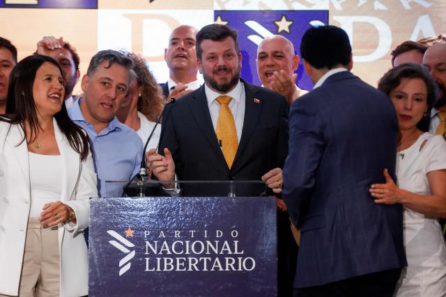 Chile's presidential candidate Johannes Kaiser, of the Libertarian National Party, delivers a conceding speech after the first exit poll results of the general election in Santiago on November 16, 2025. (Photo by Raul BRAVO / AFP)
