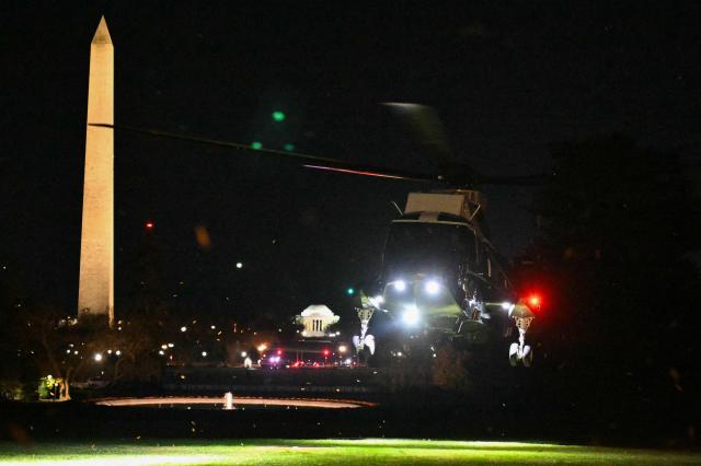 Marine One, with US President Donald Trump on board, lands on the South Lawn of the White House in Washington, DC, on November 16, 2025. Trump is returning to the White House after spending the weekend at his Mar-a-Lago, Florida, residence. (Photo by Mandel NGAN / AFP)