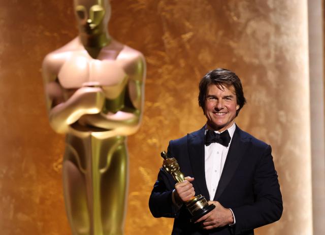 US actor producer Tom Cruise poses with his Honorary Academy Award on stage during the 16th Governors Awards at the Ray Dolby Ballroom at Ovation Hollywood in Los Angeles on November 16, 2025. (Photo by Michael Tran / AFP)