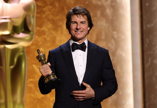 US actor producer Tom Cruise poses with his Honorary Academy Award on stage during the 16th Governors Awards at the Ray Dolby Ballroom at Ovation Hollywood in Los Angeles on November 16, 2025. (Photo by Michael Tran / AFP)