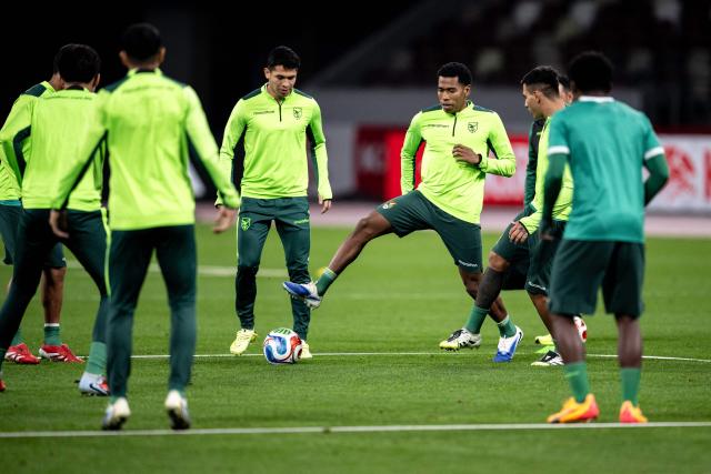 Bolivia's players take part in a training session ahead of their friendly football match against Japan at the National Stadium in Tokyo on November 17, 2025. (Photo by Philip FONG / AFP)